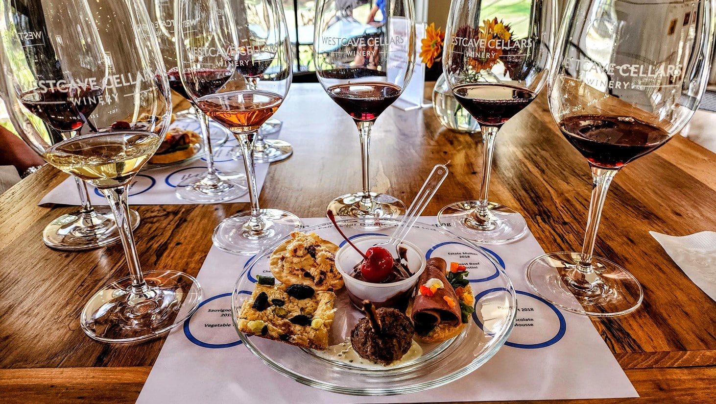 Fall Cellar Dweller pick-up party with 5 wines paired with 5 small bites. Photo by Steve Housewright