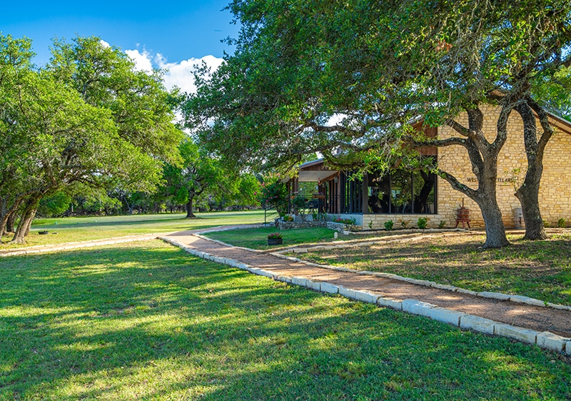 view of the outside property at Westcave Cellars Winery & Brewery near Hye, Texas